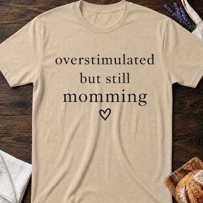 Overstimulated But Still Momming Tee – Relatable Mom Life T-Shirt